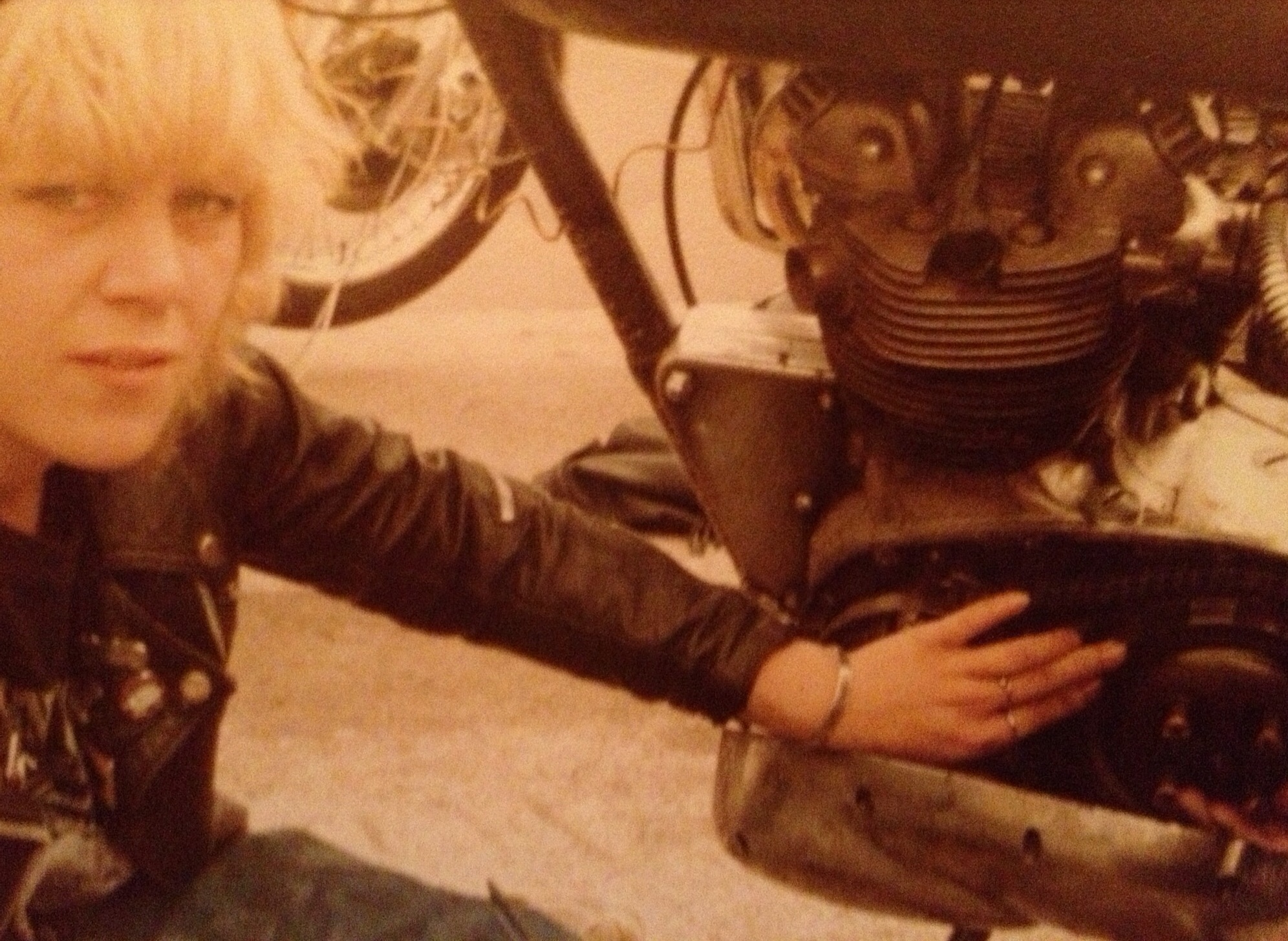 A broken young woman and a broken bike